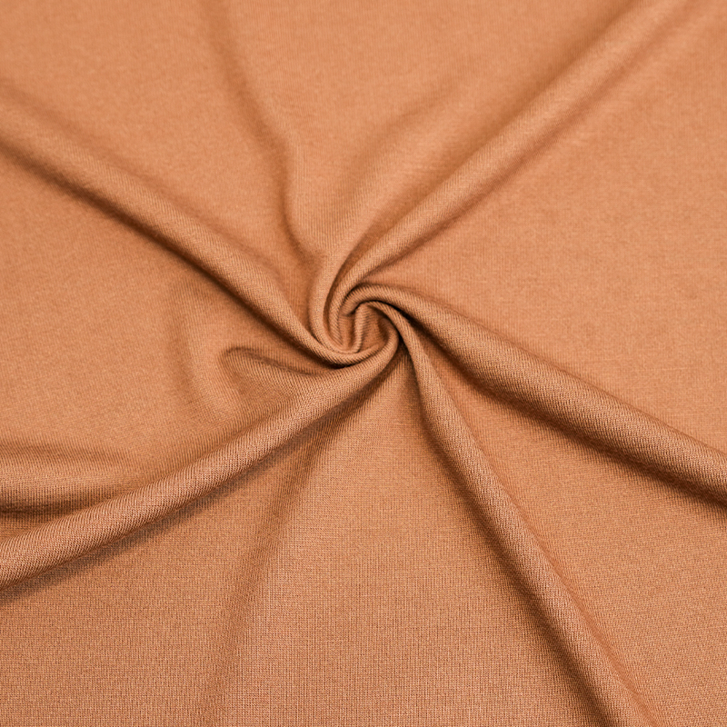 What are the differences between Bamboo Polyester Jersey Fabric and traditional polyester fabric?