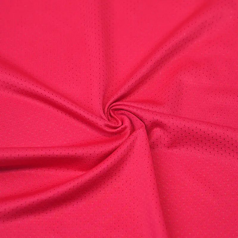 How does the breathability of sportswear fabric impact athletic performance and comfort?