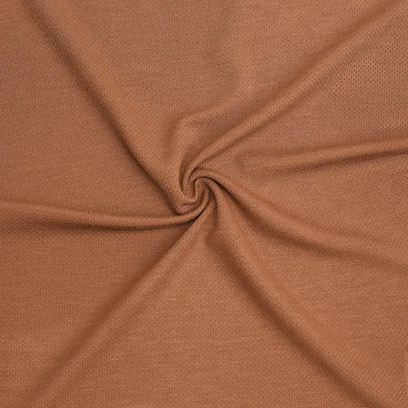 What is cool feeling fabric, and how is it designed to provide a cooling effect?